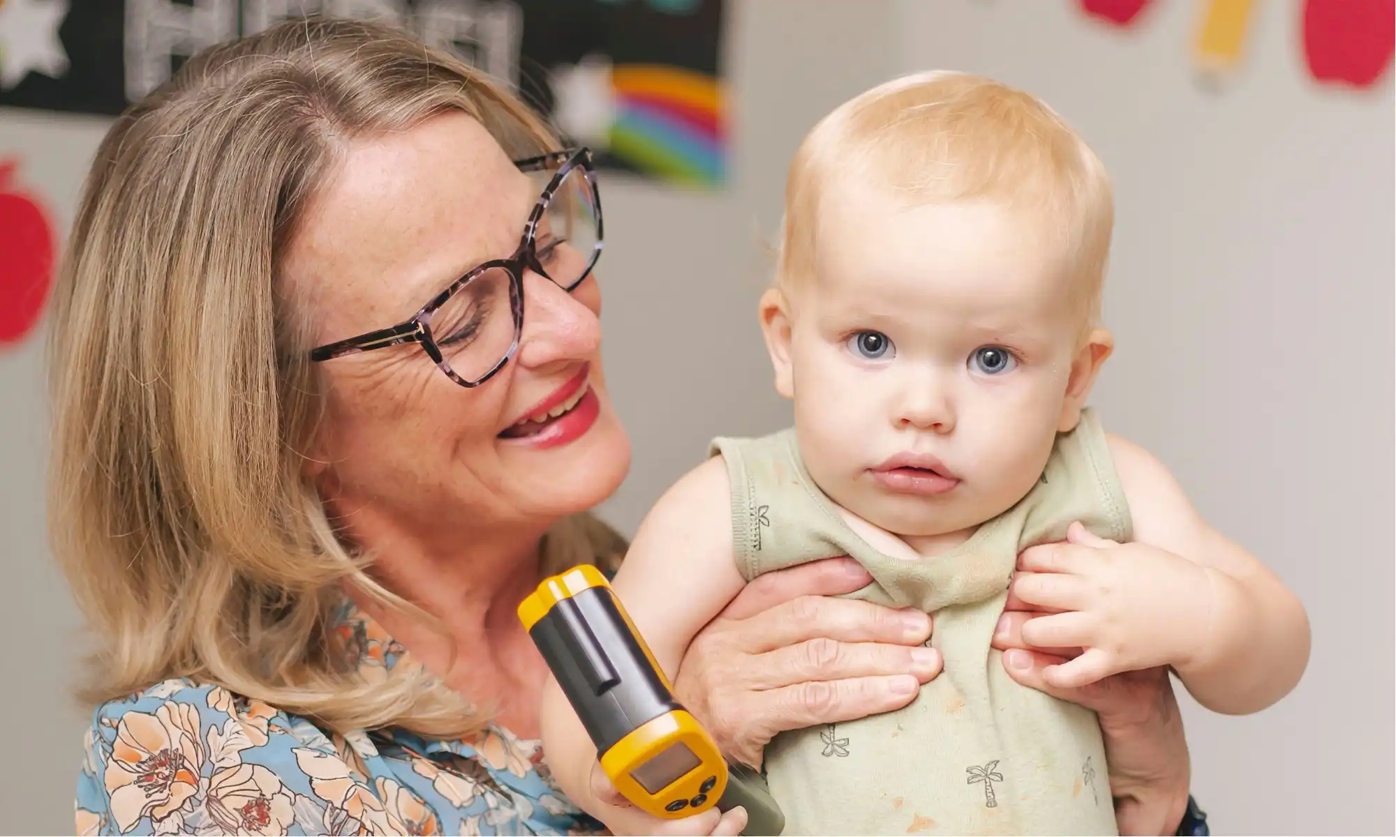 Dr. Cindy holding baby